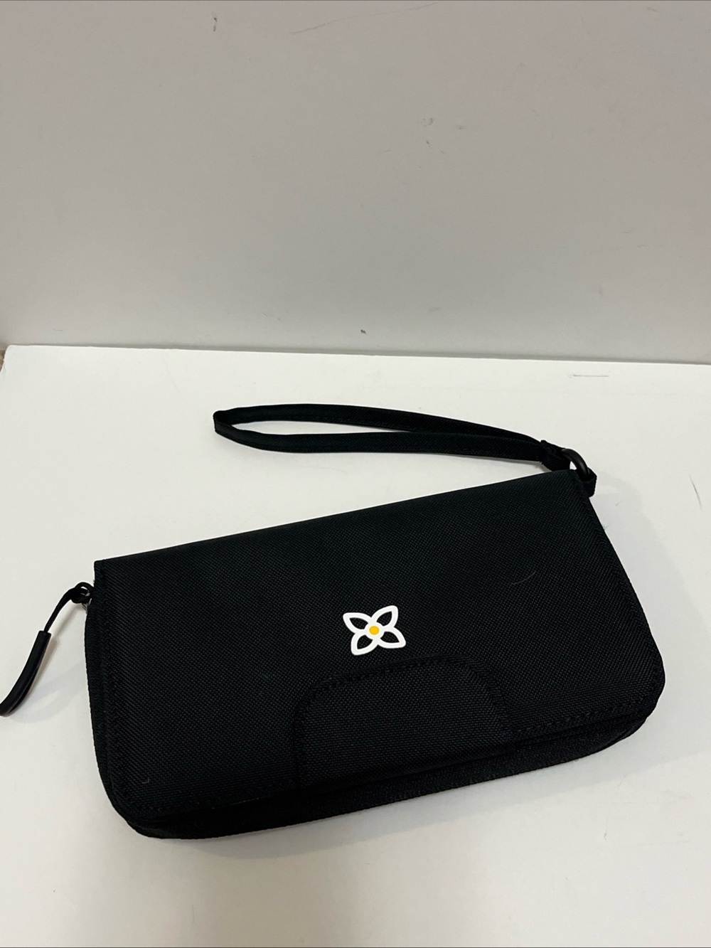 Sherpani Black Wristlet Wallet with Small Floral Logo